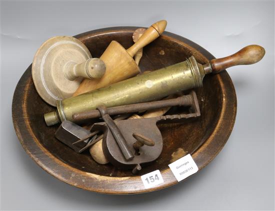 A turned sycamore bowl, 40cm, sundry treen and an iron block